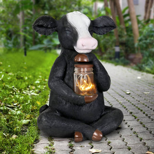 Solar Cow Garden Statue Holding A Glass Jar with 8 LED Firefly String Lights, 7 by 11 Inches | Shop Garden Decor by Exhart