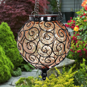 Solar Round Glass and Metal Hanging Lantern in Amber with 15 Cool White LED Firefly String Lights, 7 by 21 Inches | Exhart