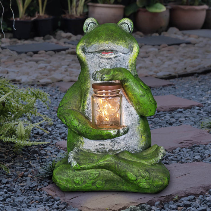 Solar Frog Garden Statue Holding a Glass Jar with Eight LED Firefly String Lights, 6 by 11 Inches