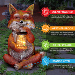 Solar Fox Garden Statue Holding a Glass Jar with Eight LED Firefly String Lights, 6.5 by 11.5 Inches | Exhart