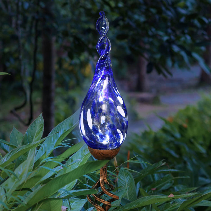 Solar Hand Blown Pearlized Blue Glass Twisted Flame Garden Stake with Finial, 36 Inch