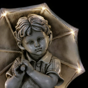 Solar Boy with Umbrella Statue in Natural Resin Finish, 19 Inch | Shop Garden Decor by Exhart
