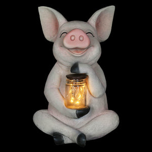 Solar Pig Garden Statue Holding a Glass Jar with Eight LED Firefly String Lights, 7 by 10.5 Inches | Exhart