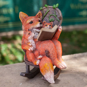 Solar Fox Family Reading a Story in a Rocking Chair Garden Statue, 12 Inch | Shop Garden Decor by Exhart