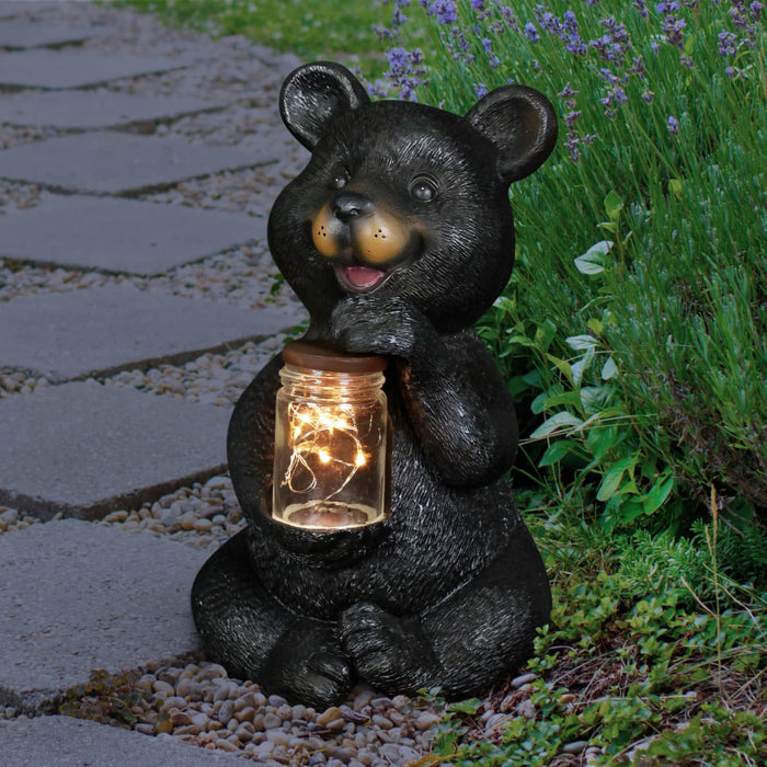 Solar Bear Garden Statue Holding Glass Jar with Eight LED Firefly String Lights, 6 by 10 Inches