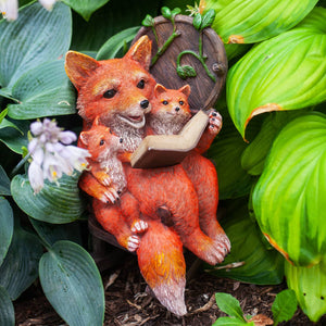 Solar Fox Family Reading a Story in a Rocking Chair Garden Statue, 12 Inch | Shop Garden Decor by Exhart