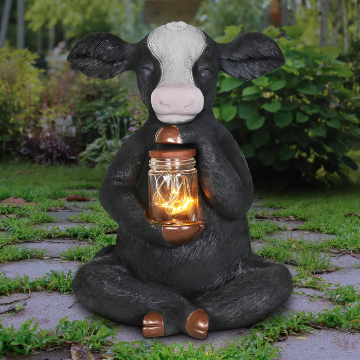 Solar Cow Garden Statue Holding A Glass Jar with 8 LED Firefly String Lights, 7 by 11 Inches