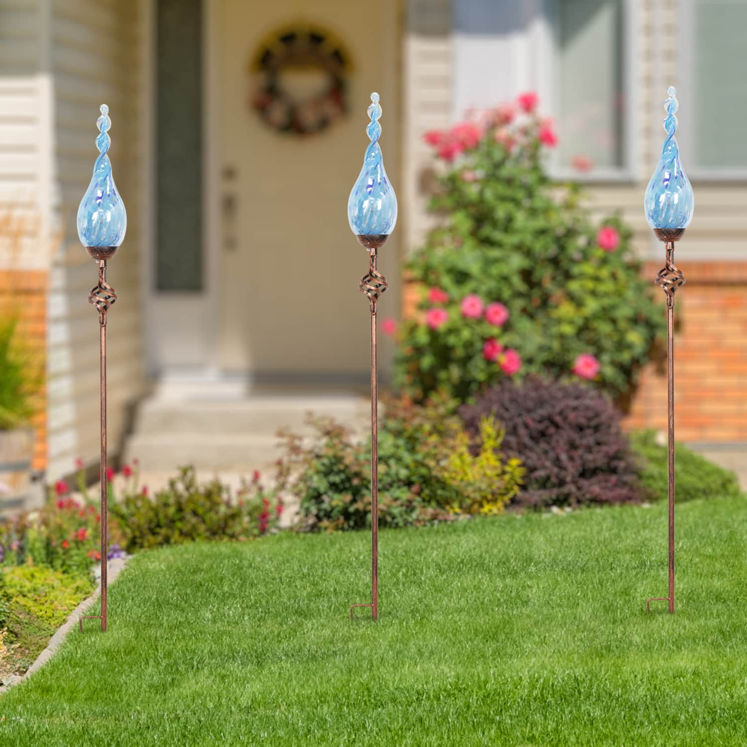 Solar Pearlized Glass Twisted Flame Garden Stake with Metal Finial Detail in Light Blue, 36 Inch | Shop Garden Decor by Exhart