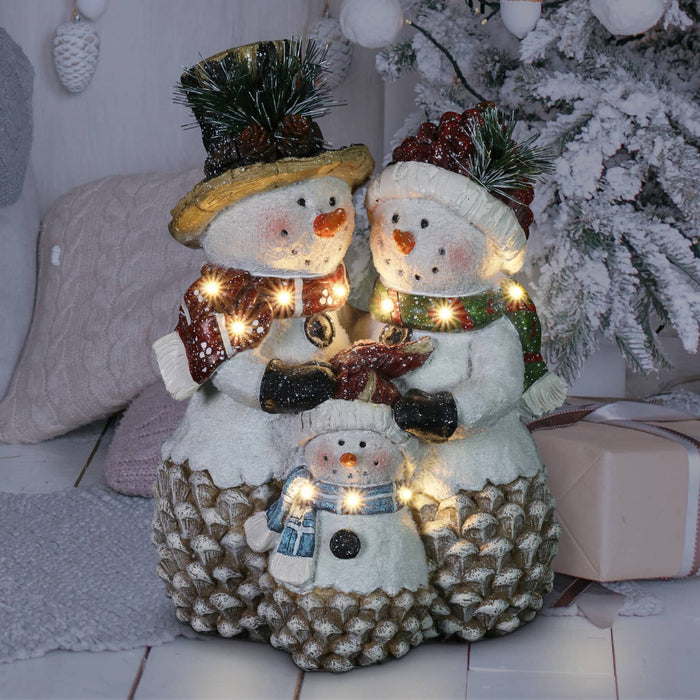 Hand Painted Embracing Holiday Snowman Family Statue with LED Scarves on a Battery Powered Timer, 11.5  Inches