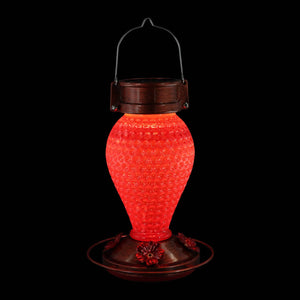 Solar Hanging Hummingbird Feeder with Illuminating Scarlet Glass, Bronze Metal Top and Base, 6.5 x 6.5 x 9.5 Inches | Exhart