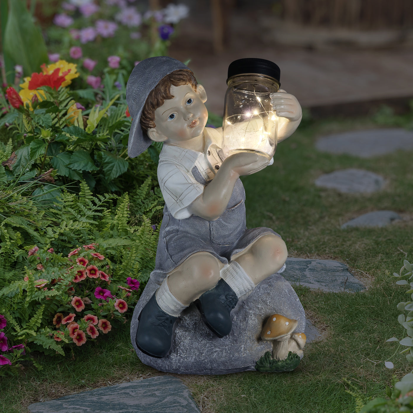 Solar Boy Holding a LED Firefly Jar Garden Statuar