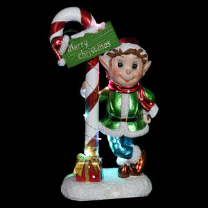 Hand Painted LED Candy Cane Elf Statuary with Merry Christmas Sign on a Battery Powered Timer, 10.5 Inches | Exhart